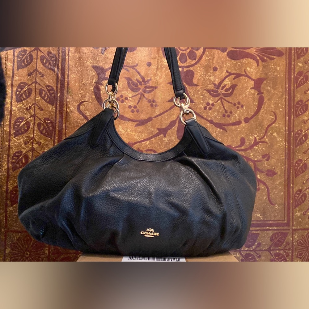 Deep brown purse with matching deep brown wallet.
